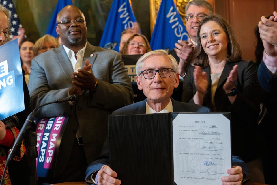 Democratic Gov. Tony Evers signs new legislative maps into law Monday, February 19, 2024 at the Capitol in Madison, Wisconsin. The maps, drawn by the governor's office and approved by the Republican-led Legislature, create new boundaries in races for state Assembly and state Senate that could end a 13-year era of lopsided Republican majorities.



Mark Hoffman/Milwaukee Journal Sentinel