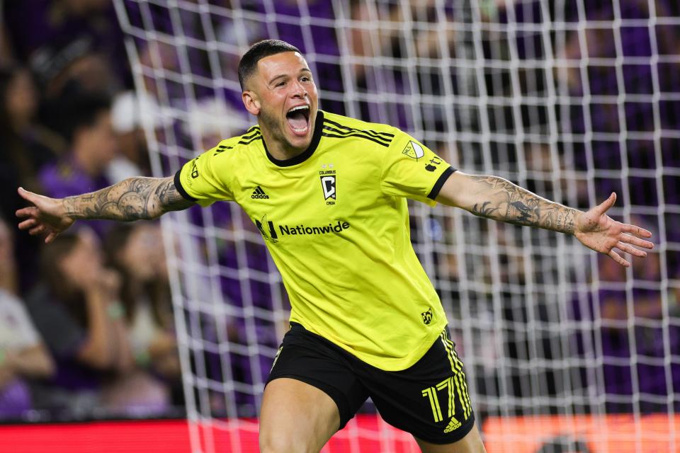 Crew forward Christian Ramirez celebrates scoring a goal against Orlando City during the first half of extra time Saturday.