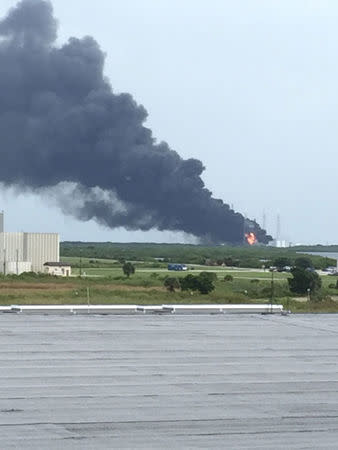 An explosion on the launch site of a SpaceX Falcon 9 rocket is shown in Cape Canaveral, Florida, U.S. September 1, 2016. Courtesy of Twitter.com/Kris N./Handout via REUTERS