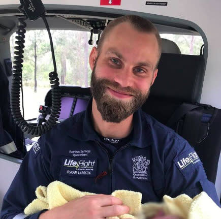 Dr Oskar Larsson with the newborn baby girl. Source: Twitter/7NewsBrisbane