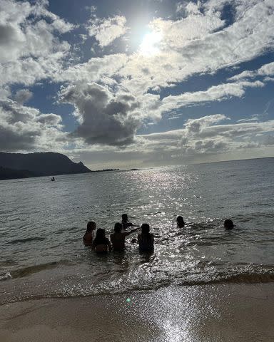 <p>Kourtney Kardashian/Instagram</p> The group played in the sea