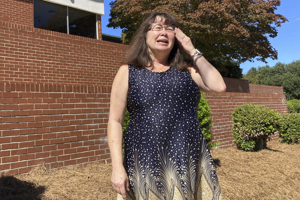 Pam Conner talks outside the former Calhoun Memorial Hospital in Arlington, Ga., on Thursday, Oct. 6, 2022. Conner leads the county hospital board nine years after the hospital closed, reducing medical services in the southwest Georgia county. (AP Photo/Jeff Amy)