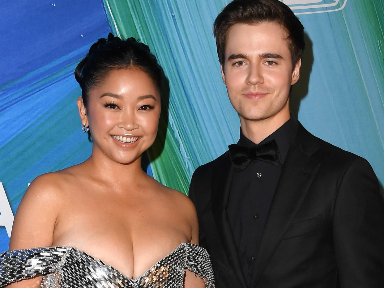 Lana Condor and Anthony De La Torre posing at the amfAR Gala on November 4, 2021 in West Hollywood, California.