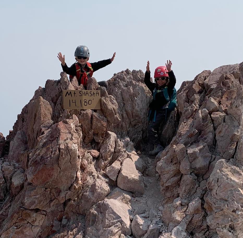 Matthew and Arabella Adams are shown celebrating their accomplishment at the peak of Mt. Shasta on Sept. 6, 2020. They are thought to be the youngest to ever summit the mountain.