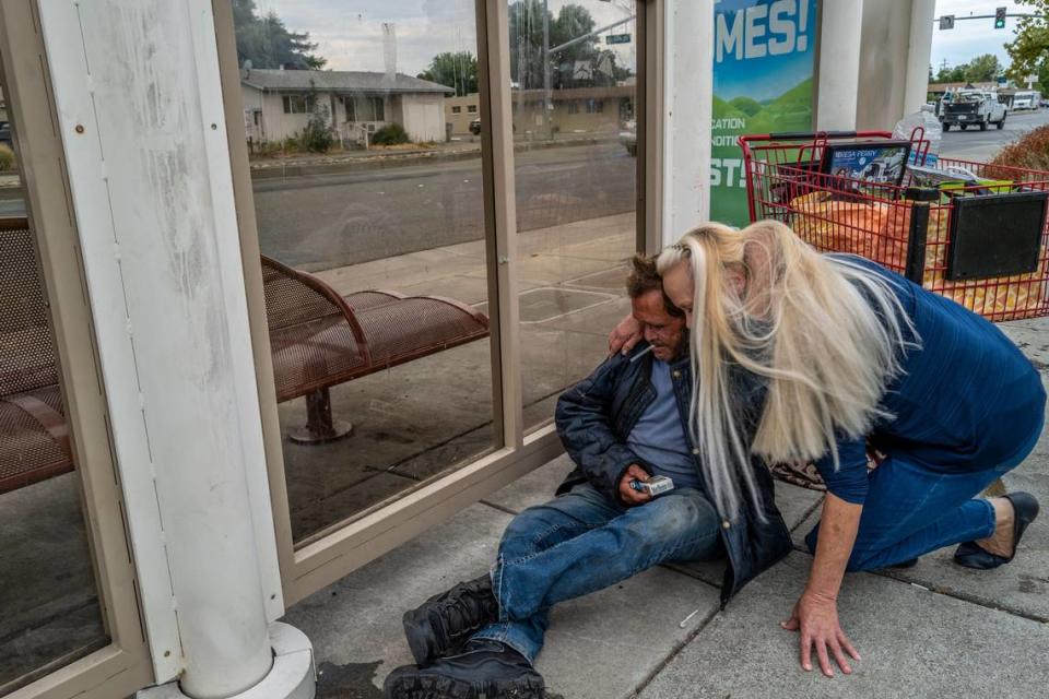 After exchanging “I love you’s” back and forth, Linda Privatte and her brother Mark Rippee embrace in Vacaville after a visit earlier this month. “It’s hard to leave because then it makes me feel guilty and it makes me feel like I’m just as bad as our U.S. mental health system,” said Privatte.