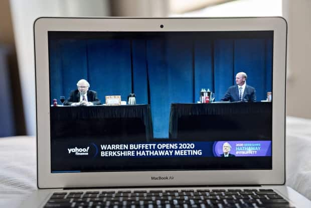 Greg Abel, right, is shown to the right of Berkshire founder Warren Buffett in this shot from the company's annual general meeting in Omaha, Nebraska. (Andrew Harrer/Bloomberg - image credit)