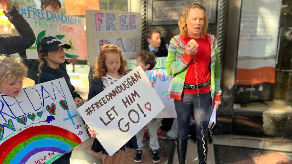 Saffrine Duggan speaks to supporters outside a Sydney court on Tuesday, July 25, as lawyers argue her husband's case. - Paul Devitt/CNN