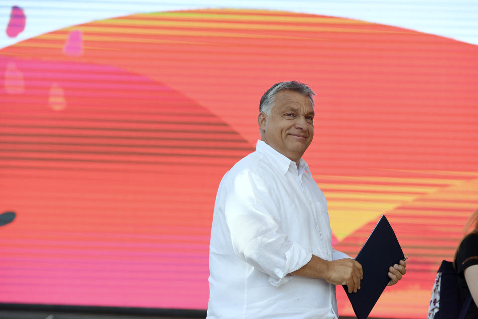 Hungarian Prime Minister Viktor Orban arrives on the stage to speak at the 30th Balvanyos Summer University and Students' Camp in Baile Tusnad, Transylvania, Romania, Saturday, July 27, 2019. (Szilard Koszticsak/MTI via AP)