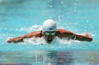 SANTA CLARA, CA - JUNE 01: Natalie Coughlin competes in the 100 meter women's butterfly during day 2 of the Santa Clara International Grand Prix at George F. Haines International Swim Center on June 1, 2012 in Santa Clara, California. (Photo by Ezra Shaw/Getty Images)