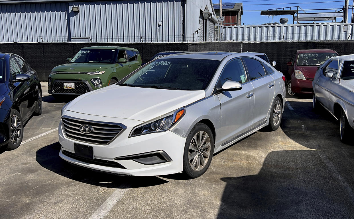 A Hyundai sedan sits in the parking lot of East Bay Tow Inc., where Attorney General Rob Bonta held a news conference, Thursday, April 20, 2023, in Berkeley, Calif., about the surge in thefts of KIA and Hyundai vehicles. Attorneys general in 17 states plus Washington, DC, on Thursday urged the federal government to recall millions of Kia and Hyundai cars because they are too easy to steal; a response to a sharp increase in thefts fueled by a viral social media challenge. (AP Photo/Terry Chea)