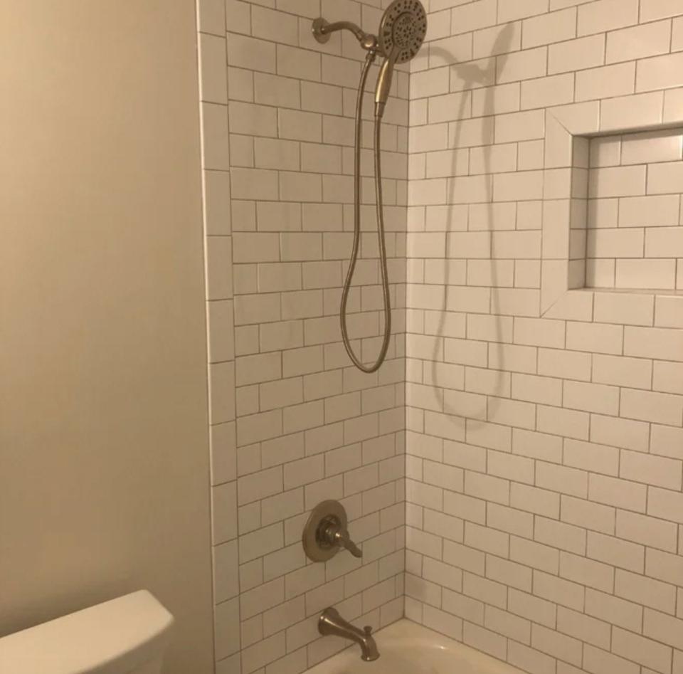 the showerhead in a reviewer's shower