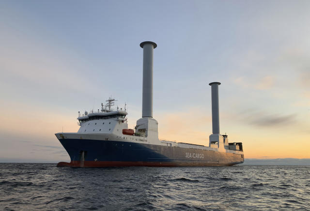 This 2021 photo shows the SC Connector, a freight-hauling vessel owned by the Norwegian company Sea-Cargo, sailing on the North Sea off the southwestern coast of Norway. The ship is equipped with two rotor sails manufactured by Finland-based Norsepower. The 38-yard-high (35-meter-high) rotors spin in the wind and help propel the vessel. It’s an example of new technologies helping the shipping industry reduce its greenhouse gas emissions. (Artur Sylwestrzak/Sea-Cargo via AP).