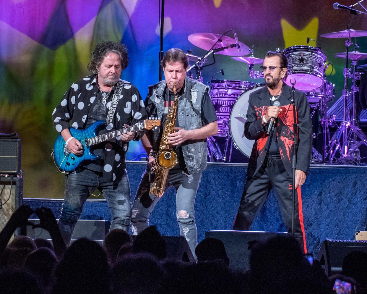 Ringo Starr, far right, performs with members of his All-Starr Band, Steve Lukather (Toto) on guitar and Warren Ham (Kansas, Toto) on saxophone. Backed by his celebrity-studded ensemble, Starr will come to Mershon Auditorium on Oct. 10.