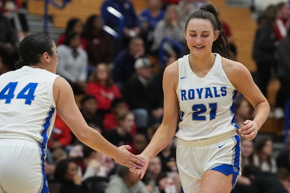 Hamilton Southeastern Royals Riley Makalusky (21) high-fives Hamilton Southeastern Royals forward Maine Hooks (44) on Saturday, Dec. 17, 2022 at Hamilton Southeastern Royals in Fishers. The Fishers Tigers defeated Hamilton Southeastern Royals, 49-48. 