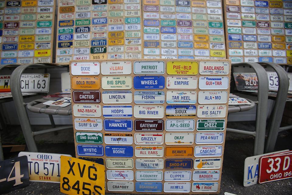 A sampling of Luke Reicosky's newly received license plates is pictured at his Brewster home.