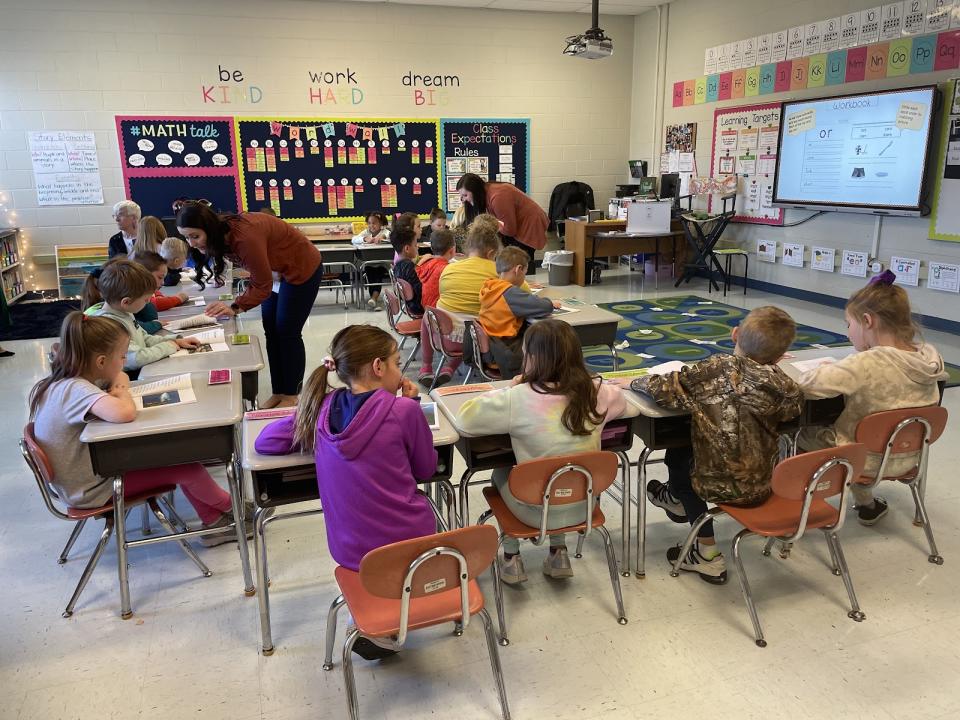 First grade students in Ms. Hannah Bowers’ class at East Side Elementary independently read decodable texts that correspond with their /or/ foundational skills lesson. District Implementation Coach Rachel Darnell and East Side Elementary Instructional Coach Shannon Barnett assist.(Courtesy of Knowledge Matters Campaign)