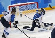 Ice Hockey - Pyeongchang 2018 Winter Olympics - Women's Semifinal Match - U.S. v Finland- Gangneung Hockey Centre, Gangneung, South Korea - February 19, 2018 - Noora Raty of Finland misses on saving a goal scored by Dani Cameranesi of the U.S. REUTERS/Grigory Dukor