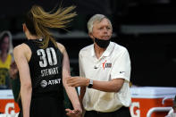 Seattle Storm head coach Dan Hughes looks toward the court in the first half of a WNBA basketball game against the Las Vegas Aces, Saturday, May 15, 2021, in Everett, Wash. (AP Photo/Elaine Thompson)