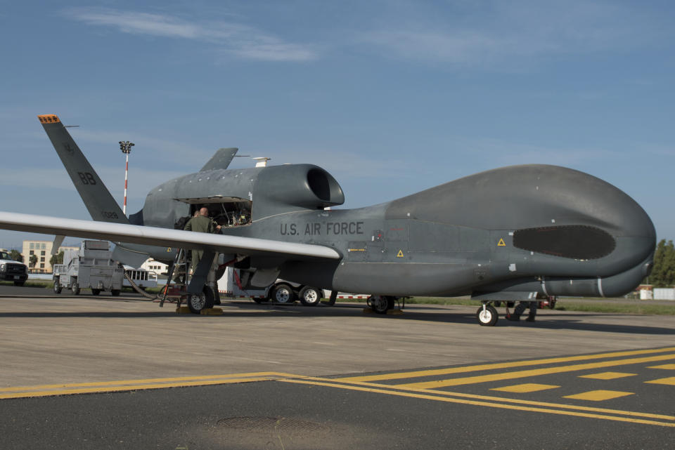 In this Oct. 24, 2018, photo released by the U.S. Air Force, members of the 7th Reconnaissance Squadron prepare to launch an RQ-4 Global Hawk at Naval Air Station Sigonella, Italy. Iran's Revolutionary Guard shot down a U.S. RQ-4 Global Hawk on Thursday, June 20, 2019, amid heightened tensions between Tehran and Washington over its collapsing nuclear deal with world powers, American and Iranian officials said, though they disputed the circumstances of the incident. (Staff Sgt. Ramon A. Adelan/U.S. Air Force via AP)