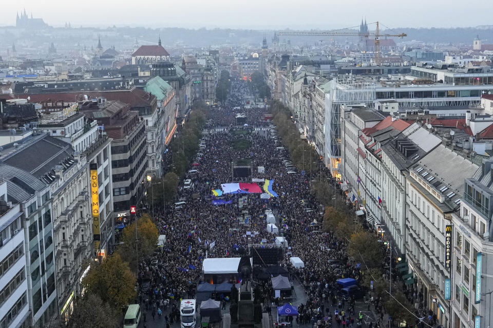 Tens of thousands of people gather for an anti-war protest in Prague, Czech Republic, Sunday, Oct. 30, 2022. (AP Photo/Petr David Josek)