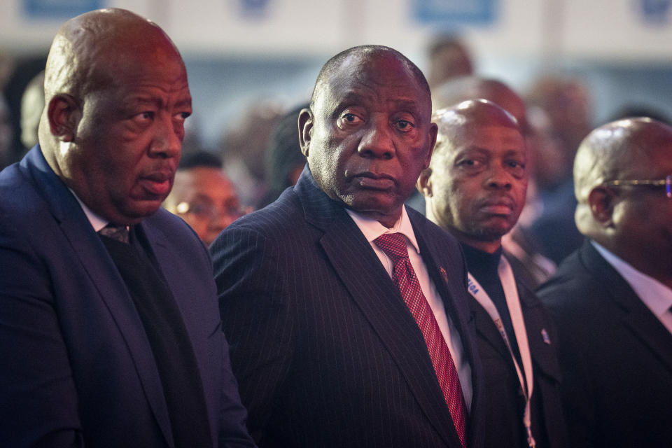 South African President Cyril Ramaphosa, center, arrives at the National Results Operations Center during the announcement of the results in South Africa's general elections, in Johannesburg, South Africa on Sunday, June 2, 2024. Humbled by a stinging election result, South Africa's African National Congress was talking to everyone in an effort to form a stable coalition government for Africa's most advanced economy after it lost its 30-year majority. (AP Photo/Emilio Morenatti)