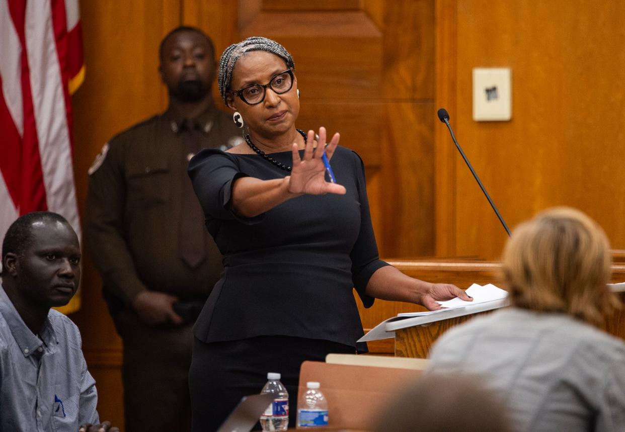 Lisa Ross, Bul Mabil's attorney, asks Karissa Bowley, Dau Mabil's wife, to listen to her full question before speaking during the court case about Dau's death investigation at the Hinds County Chancery Court in Jackson on Tuesday.