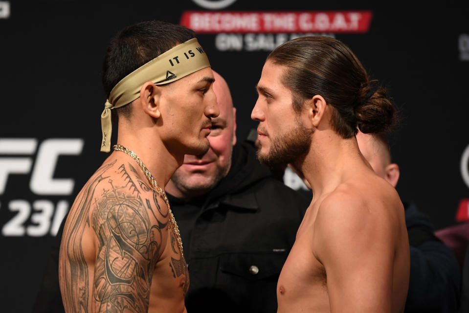 Max Holloway and Brian Ortega face-off during the UFC 231 weigh-in at Scotiabank Arena on Dec. 7, 2018 in Toronto, Canada. (Getty Images)