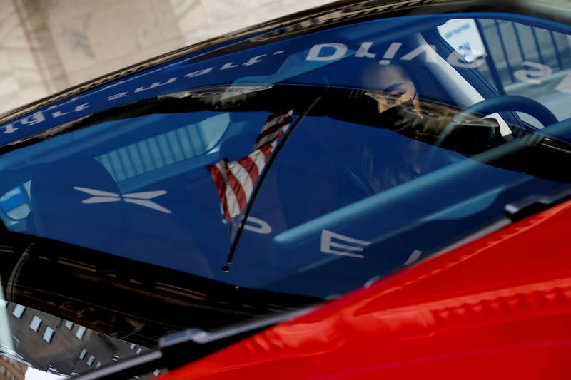 FILE PHOTO: An Xpeng P7 performance electric vehicle outside the New York Stock Exchange (NYSE) ahead of the Chinese company's IPO in New York