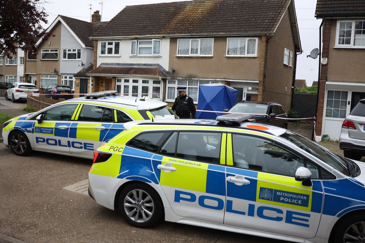 Police guard the scene of the fatal XL Bully attack in Cornwall Close in Havering on Tuesday morning (Marcin Nowak/LNP)