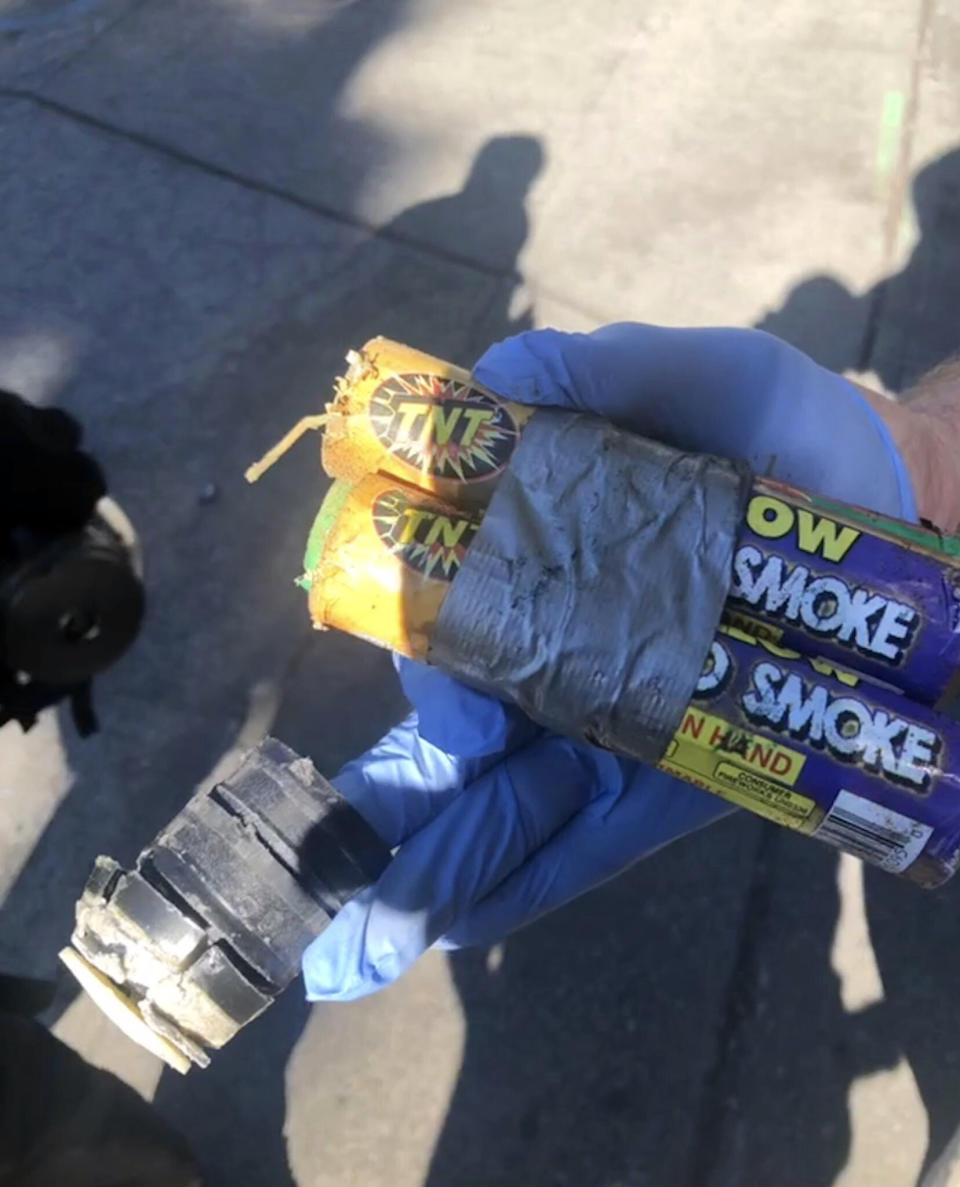 This photo posted by the Seattle Police Department on their Twitter page shows items the police say were thrown at them during rowdy protests in the city on Saturday, July 25, 2020. Police declared a riot in the city’s Capitol Hill neighborhood and made arrests. (Seattle Police Department via AP)