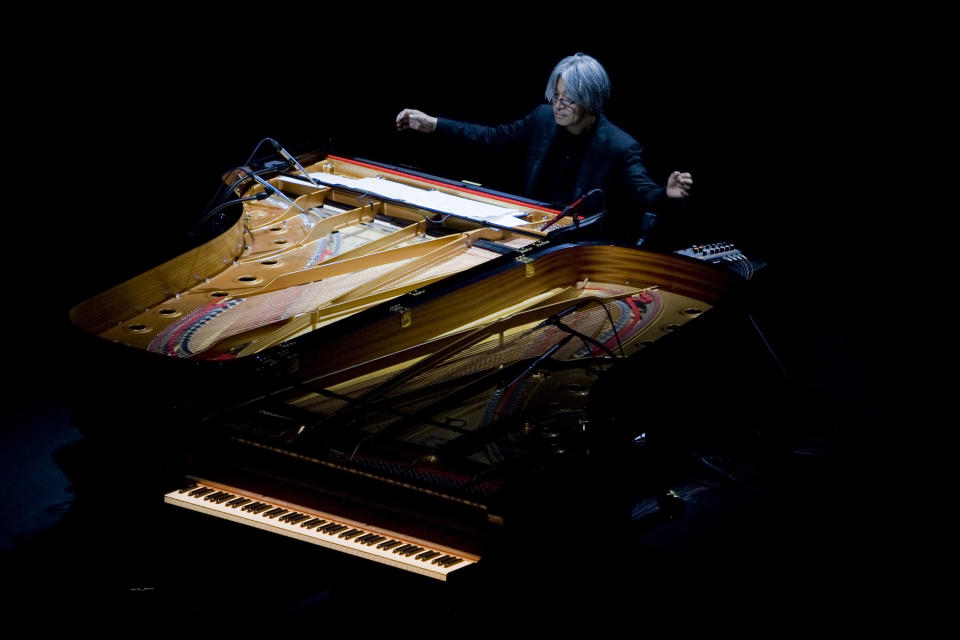 FILE - Japanese composer Ryuichi Sakamoto performs at Rome's Auditorium, on Oct. 28, 2009. Japan's recording company Avex says Sakamoto, a musician who scored for Hollywood movies such as “The Last Emperor” and “The Revenant,” has died. He was 71. He died March 28, according to the statement released Sunday, April 2, 2023. (AP Photo/Domenico Stinellis, File)