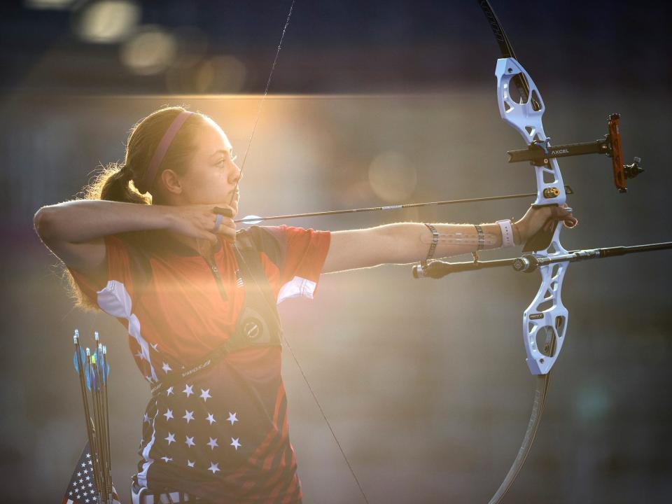 American archer Jennifer Mucino-Fernandez aims at sunset during the Tokyo Olympics