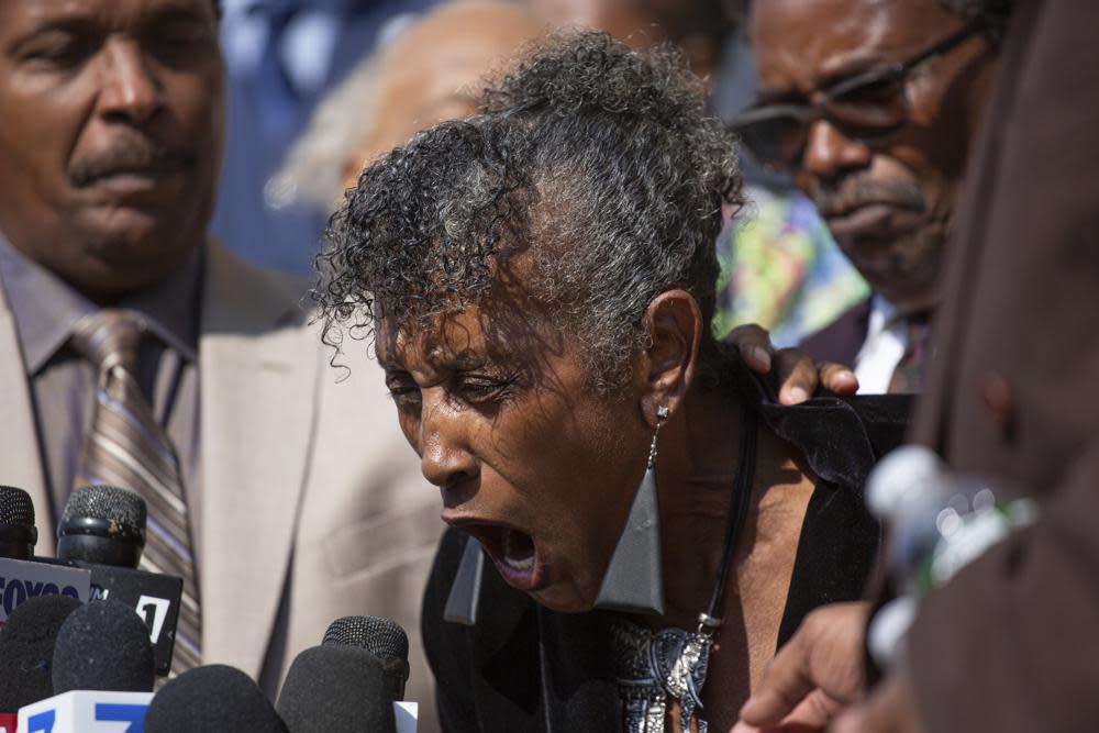 Robin Harris, the daughter of Ruth Whitfield, cries out during a press conference outside the Antioch Baptist Church on Thursday, May 19, 2022, in Buffalo, N.Y. (AP Photo/Joshua Bessex)