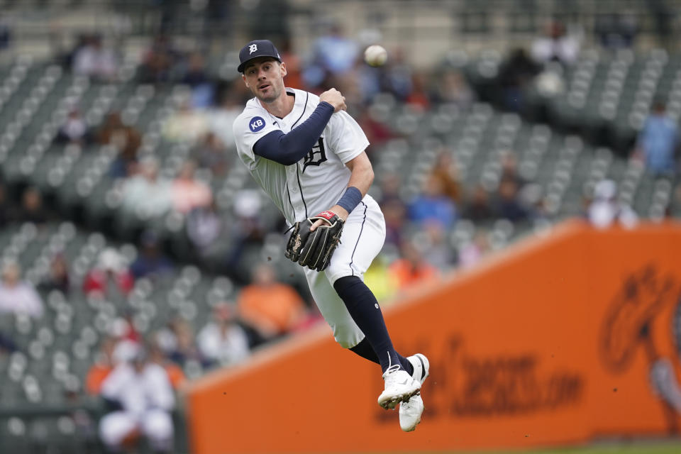 Detroit Tigers shortstop Ryan Kreidler throws Kansas City Royals' MJ Melendez out at first base in the fifth inning of a baseball game in Detroit, Thursday, Sept. 29, 2022. (AP Photo/Paul Sancya)