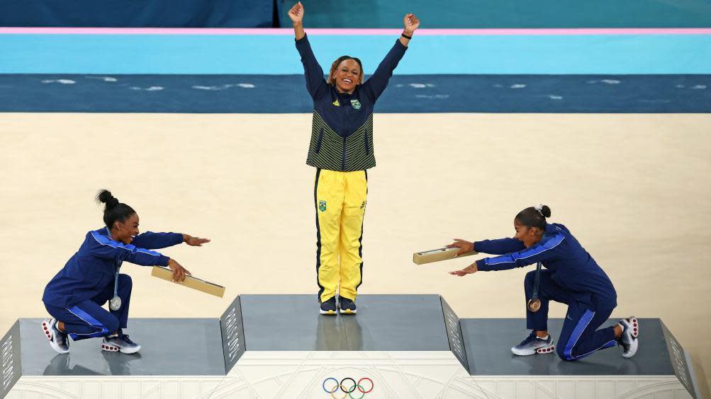 Biles bows to 'queen' Andrade in iconic medal moment