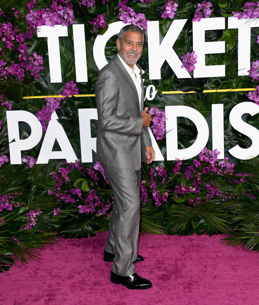 George Clooney walks the red carpet at the 