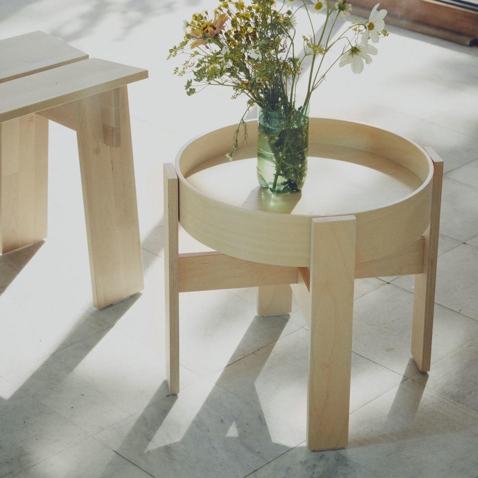 <p>This side table – just £50 — is ideal for small spaces. With a tray-like top, it's great for holding accessories without the worry of items slipping off. The soft wood is sure to give a Scandi feel to any home. </p>