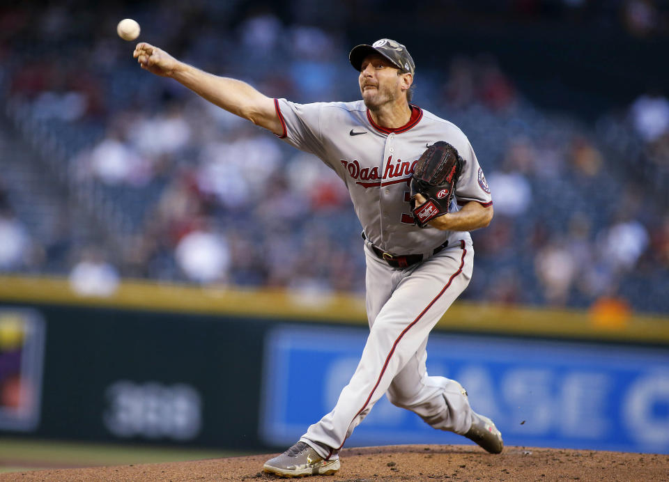 Washington Nationals' Max Scherzer delivers a pitch against the Arizona Diamondbacks during the first inning of a baseball game Friday, May 14, 2021, in Phoenix. (AP Photo/Darryl Webb)