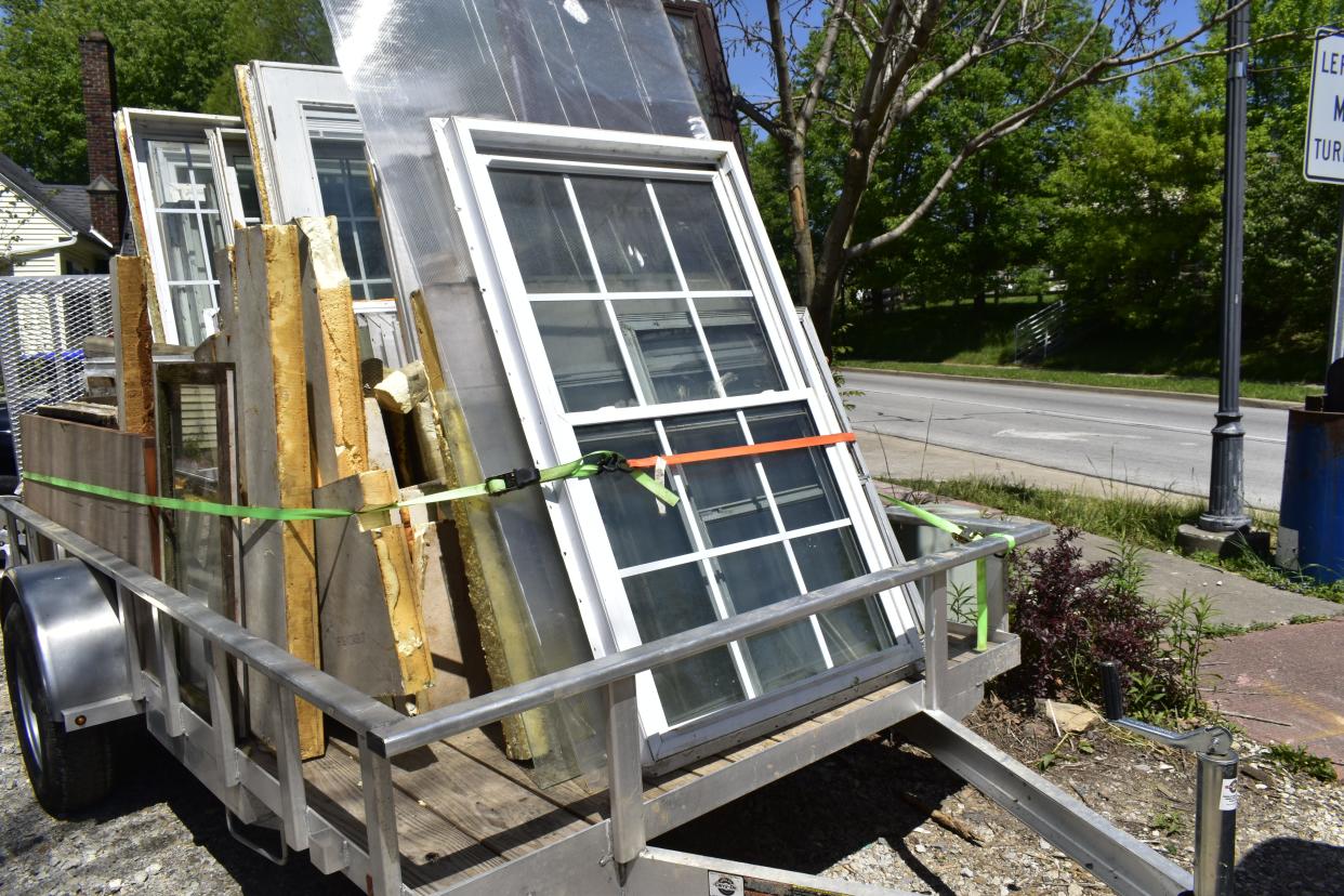 Robert Lowers has un-installed dozens of windows at his Ellettsville home to come into compliance with the town's  planning ordinances.