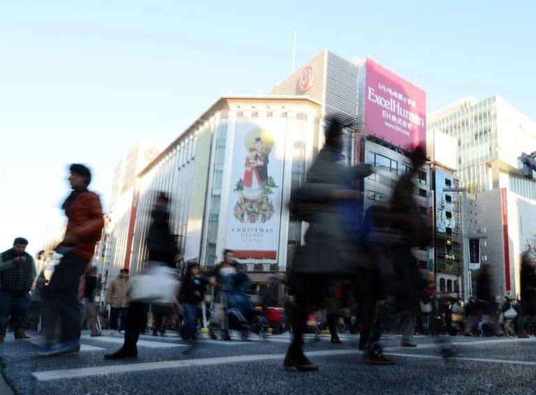 File photo of shoppers in the upmarket Ginza shopping district in Tokyo on December 1, 2012. The sound of Mandarin-speaking tourists and the cash tills they set ringing have become rare in Tokyo's upmarket Ginza district, retailers say, since a flare-up in an island row between China and Japan