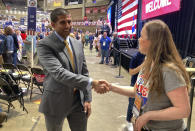 Republican gubernatorial candidate Dr. Neil Shah works the delegates to the Minnesota GOP State Convention on Saturday, May 14, 2022, at the Mayo Civic Center in Rochester, Minn. (AP Photo/Steve Karnowski)