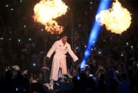 <p>Fighting fire with fire: Anthony Joshua makes his entrance to the ring </p>