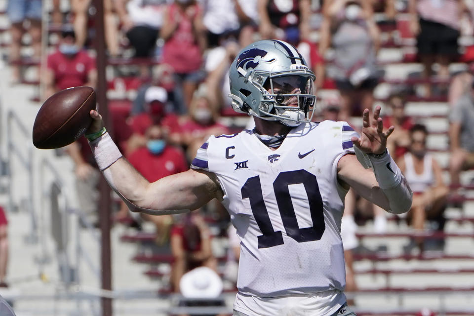 FILE - In this Sept. 26, 2020, file photo, Kansas State quarterback Skylar Thompson (10) throws a pass in the second half of an NCAA college football game against Oklahoma in Norman, Okla. (AP Photo/Sue Ogrocki, File)