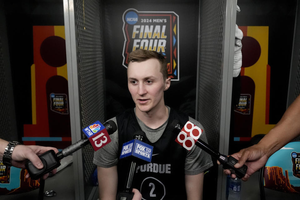 Purdue guard Fletcher Loyer speaks with reporters ahead of a Final Four college basketball game in the NCAA Tournament, Thursday, April 4, 2024, in Glendale, Ariz. NC State plays Purdue on Saturday. (AP Photo/Brynn Anderson )