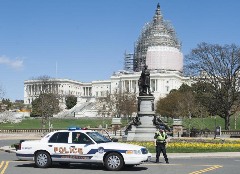 Police respond to reports of a shooting at the US Capitol in Washington, DC, April 11, 2015