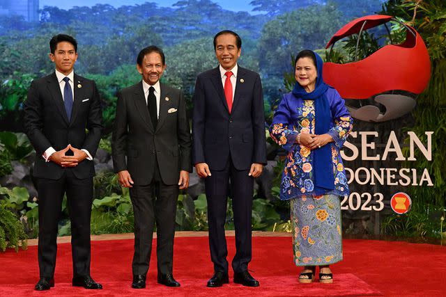 <p>ADEK BERRY/POOL/AFP via Getty</p> Prince Abdul Mateen (left), Sultan Hassanal Bolkiah, President Joko Widodo and First Lady Iriana Widodo