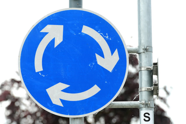 General view of a roundabout sign, London. 