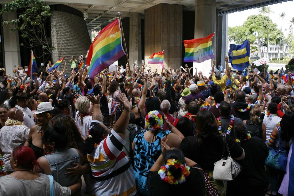 Supporters of same-sex marriage celebrate after the Hawaii State Senate approved a bill allowing same-sex marriage to be legal in the state of Hawaii, in Honolulu