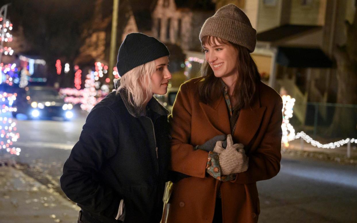 Kristen Stewart and Mackenzie Davis in a rare upbeat moment from Happiest Season - Hulu/AP