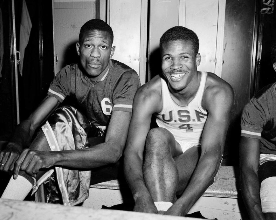 In this March 1, 1956, file photo, K.C. Jones, captain of the University of San Francisco Dons, right, is shown with teammate Bill Russell in San Francisco. (AP Photo/Robert Houston, File)